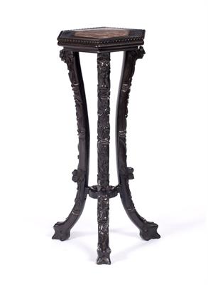 Lot 410 - A Chinese hardwood hexagonal urn table