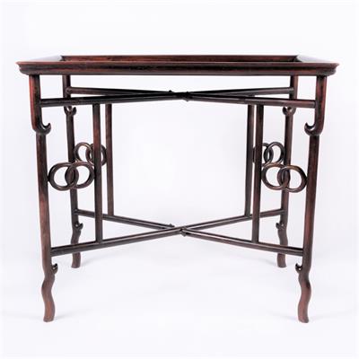 Lot 416 - A Chinese hardwood rectangular butlers stand