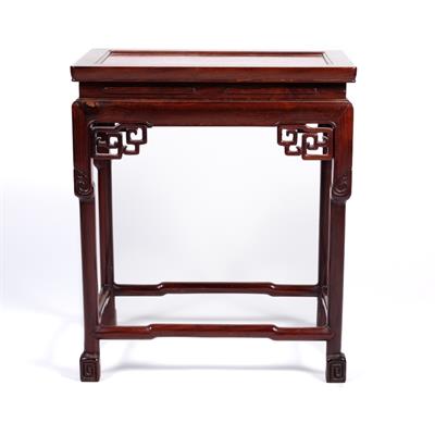 Lot 440 - A Chinese hardwood urn table