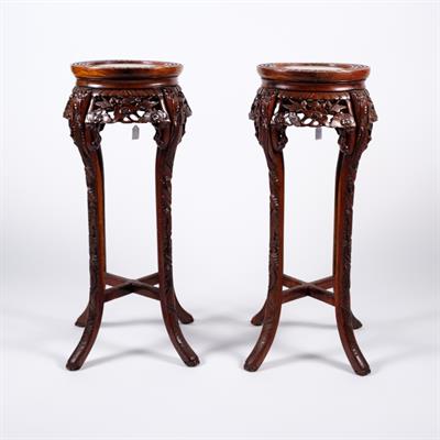 Lot 443 - A pair of Chinese hardwood stands