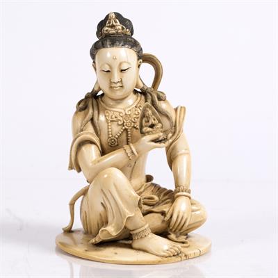 Lot 487 - A Chinese carved ivory figure of Quanyin