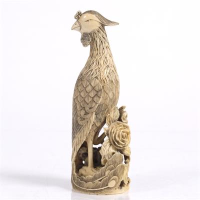 Lot 488 - A Chinese ivory carving of a phoenix