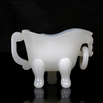 Lot 489 - A Beijing opaline white glass libation cup