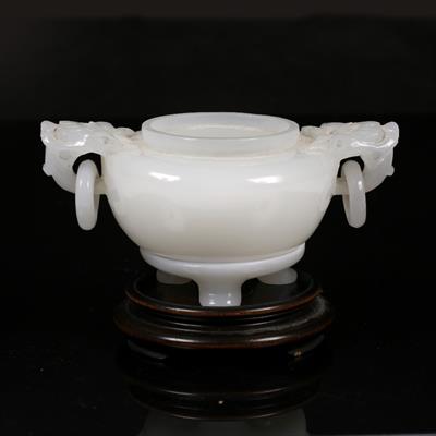 Lot 491 - A fine Beijing white glass emulating jade two handled ting