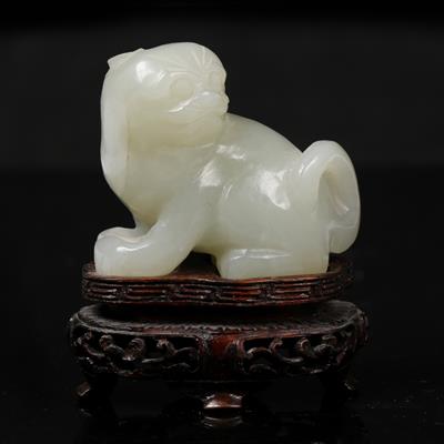 Lot 493 - A Chinese pale green jade