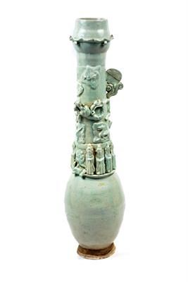 Lot 497 - A Chinese celadon tall funerary vase