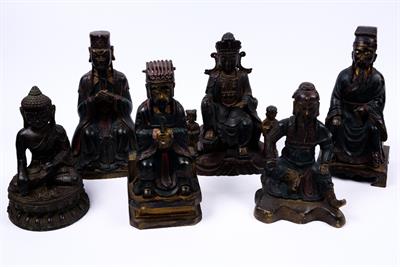 Lot 513 - A Chinese bronze seated buddha