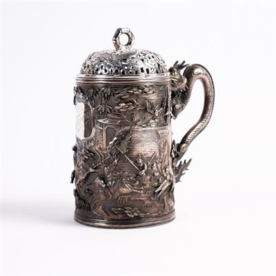 Lot 525 - A Chinese white metal tankard