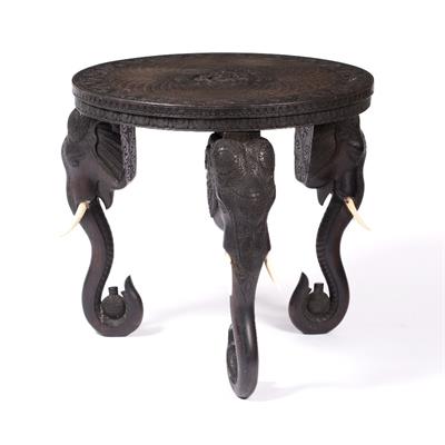 Lot 616 - An Indian carved occasional table