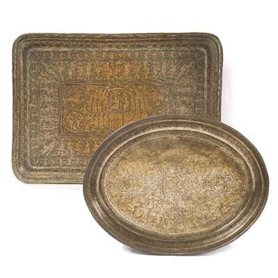 Lot 632 - A Qajar engraved rectangular brass tray