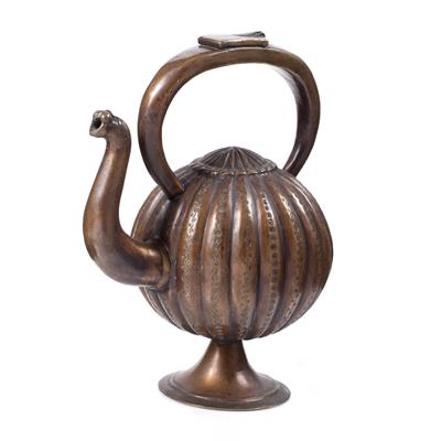 Lot 653 - An Indian copper ewer