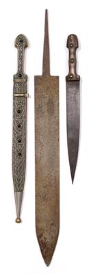 Lot 664 - A collection of three Middle Eastern daggers