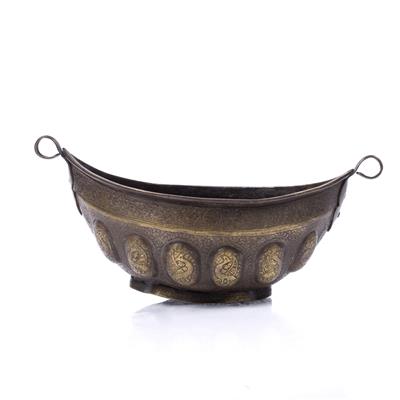 Lot 675 - A Safavid brass kashkul