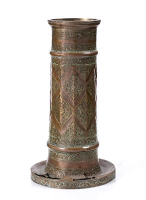 Lot 680 - A Safavid copper columnar candlestick