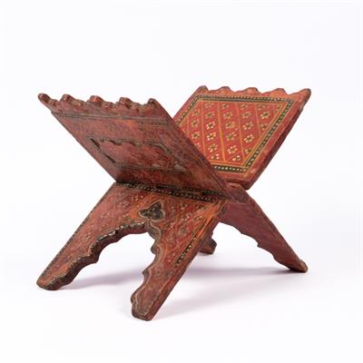 Lot 694 - An Indian polychrome painted manuscript stand