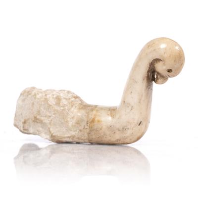 Lot 701 - A Mughal carved marble cloth hook