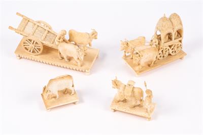 Lot 714 - An Indian carving of ivory model of carriage pulled by ox