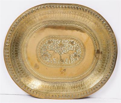 Lot 716 - A large embossed Indian tray/table top