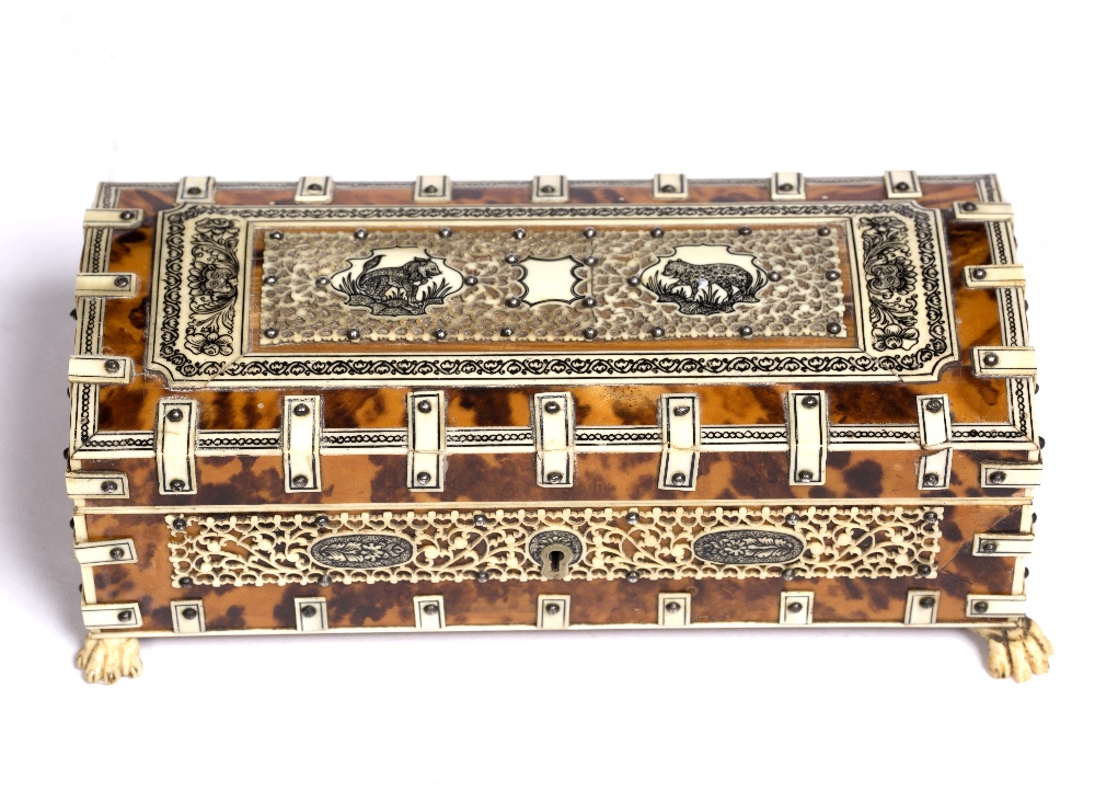 Lot 724 - An Indian tortoiseshell and ivory casket