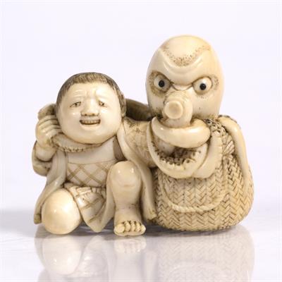 Lot 760 - A Japanese ivory netsuke of a youth