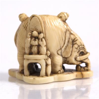 Lot 761 - A Japanese ivory netsuke of an elephant