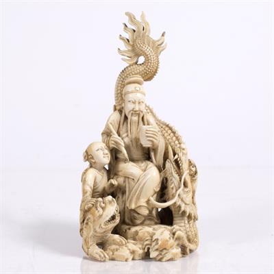 Lot 768 - A Chinese ivory carving of the dragon doctor