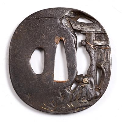 Lot 770 - A Japanese iron tsuba