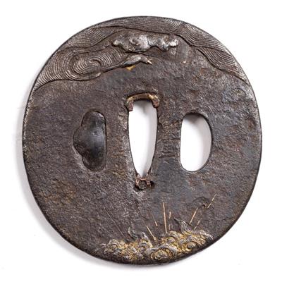 Lot 772 - A Japanese iron tsuba