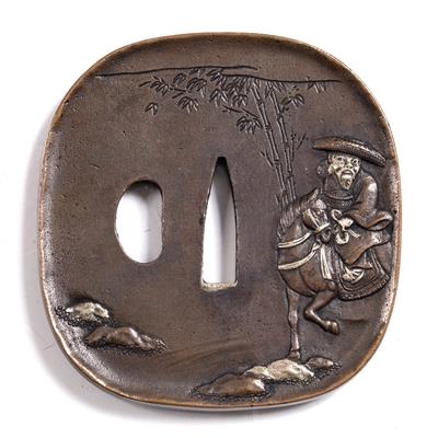 Lot 773 - A Japanese bronsze tsuba