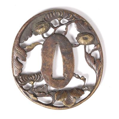 Lot 785 - A Japanese bronze tsuba