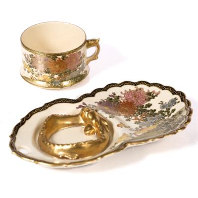 Lot 814 - A Satsuma tea cup and saucer