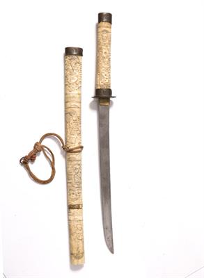 Lot 827 - A Japanese carved bone dagger (kaiken)