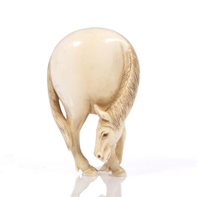 Lot 848 - A Japanese ivory netsuke of a horse