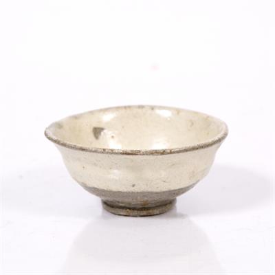 Lot 849 - A Japanese Karatsu stoneware sake cup