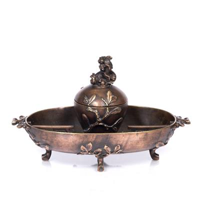 Lot 860 - A Japanese bronze desk stand