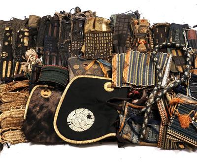 Lot 875 - A group of Japanese armour components