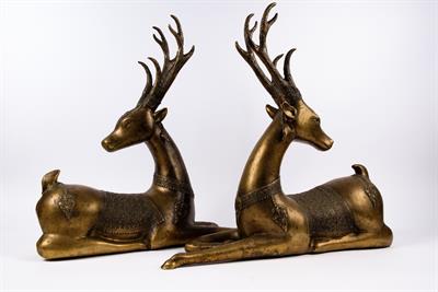 Lot 917 - A pair of bronze model recumbent deer