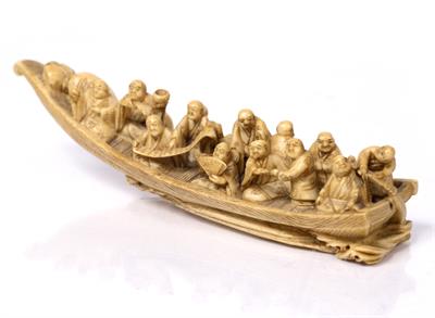 Lot 938 - A Japanese ivory okimono