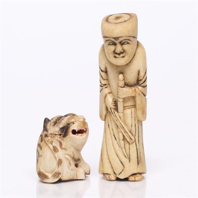 Lot 946 - A Japanese ivory netsuke