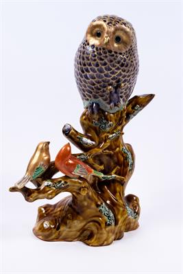 Lot 949 - A Japanese Kutani porcelain sculpture of an owl and two song birds