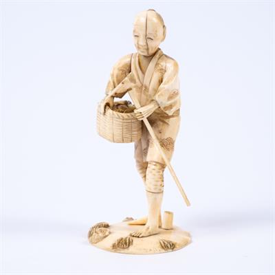 Lot 953 - A Japanese ivory okimono of a farmer