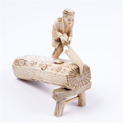 Lot 959 - A Japanese ivory okimono of a carpenter