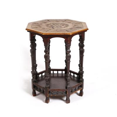 Lot 9 - An Arts and Crafts carved wood octagonal occasional table