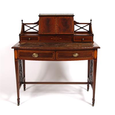 Lot 19 - An Edwardian bow fronted mahogany writing desk