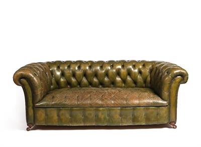 Lot 45 - A Victorian green leather upholstered Chesterfield sofa