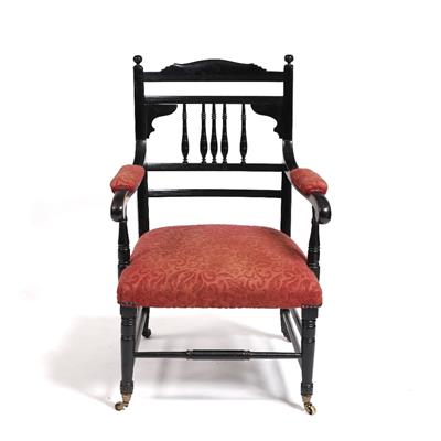 Lot 50 - A 19th Century ebonised armchair