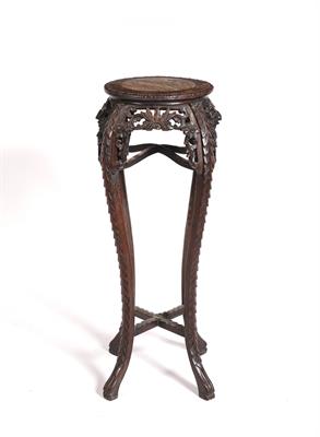 Lot 60 - A Chinese hard wood urn stand