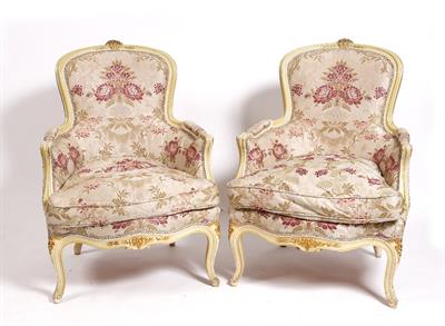 Lot 62 - A pair of French painted fauteuils