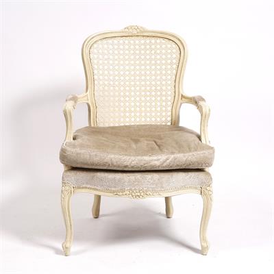 Lot 97 - A painted French style elbow chair