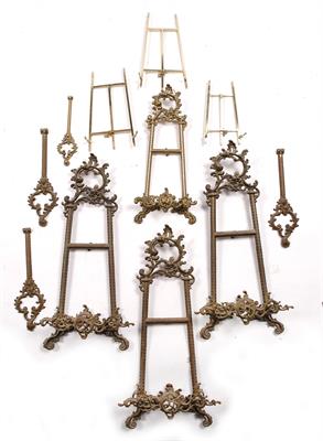 Lot 109 - A collection of gilt metal easel stands